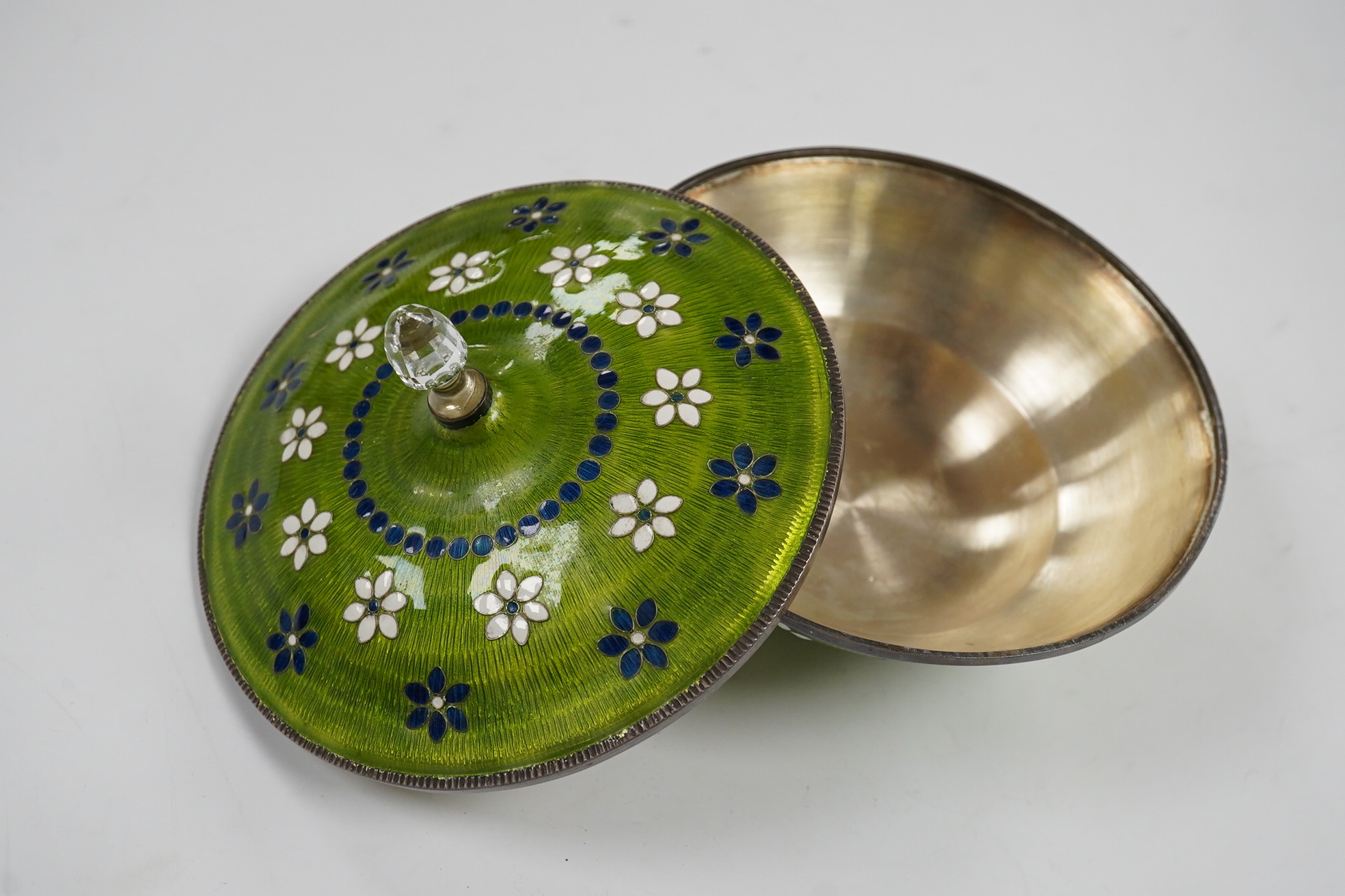 A Korean white metal and enamelled circular pot and cover, diameter 11cm, gross weight 7.6oz. Condition - fair to good